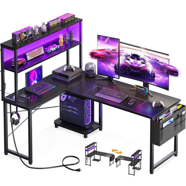 53-inch reversible L-shaped gaming desk shelf with LED lighting, power outlets, and storage hooks for home office use in black
