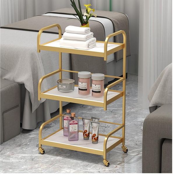 Beauty salon high-end trolley nail tattoo instrument shelving light luxury foot bath barbershop tool car storage rack  

Rewritten:  

Upscale salon trolley for nail and tattoo tools with shelving, luxurious foot bath, and barbershop storage cart