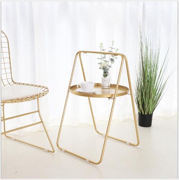 Bedroom Bedside Storage Cabinet Living Room Furniture Creative A-shaped portable tea table modern simple removable sofa reception

Rewritten as:
Creative A-shaped portable tea table for bedroom, living room, or sofa area with modern simple design and removable storage