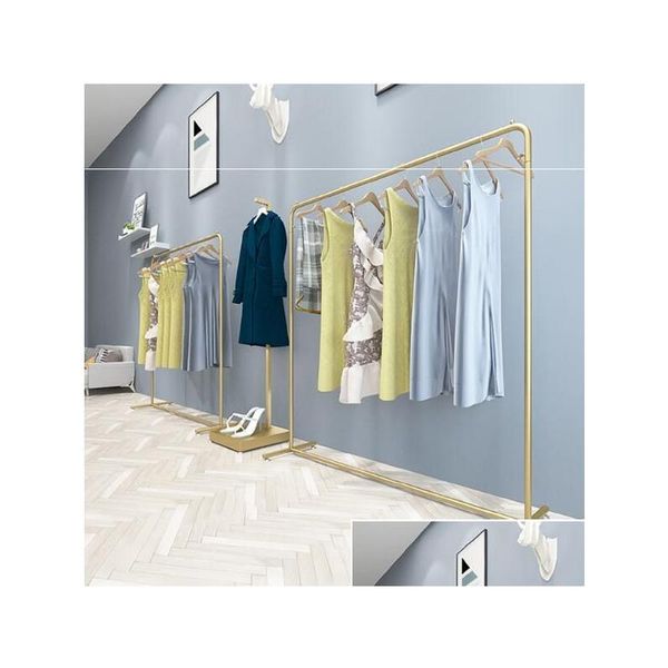 Bedroom Furniture Iron Art Cloth Rack Nordic Light Clothing Store or Type Display Clothes Drop Delivery Home Garden Ot2Xz

Nordic-style iron art clothing rack for bedroom furniture, displaying and storing garments in home gardens