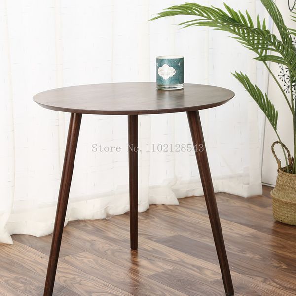 Black walnut-hued compact coffee table for small spaces, modern round sofa side table with Japanese-inspired design