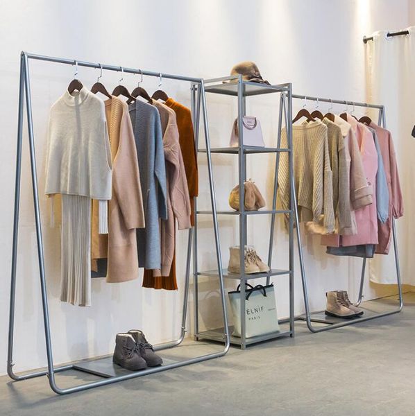 Children's clothing display rack for vintage women's apparel in stores