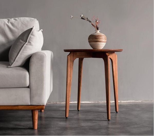 Classic Nordic solid wood compact tea table for living rooms, featuring white wax finish, rounded edges, and minimal hardware