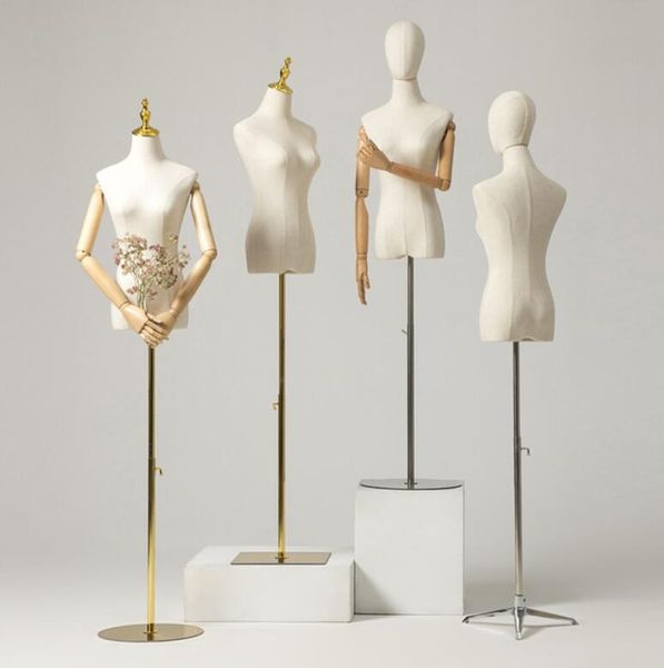 Clothing store display props for commercial furniture, featuring women's half-body dress mannequins and wedding attire racks