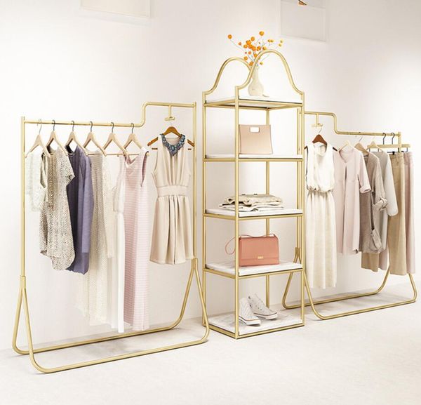 Clothing store display rack for luxury women's apparel in shopping malls, featuring iron floor-standing side cloth racks