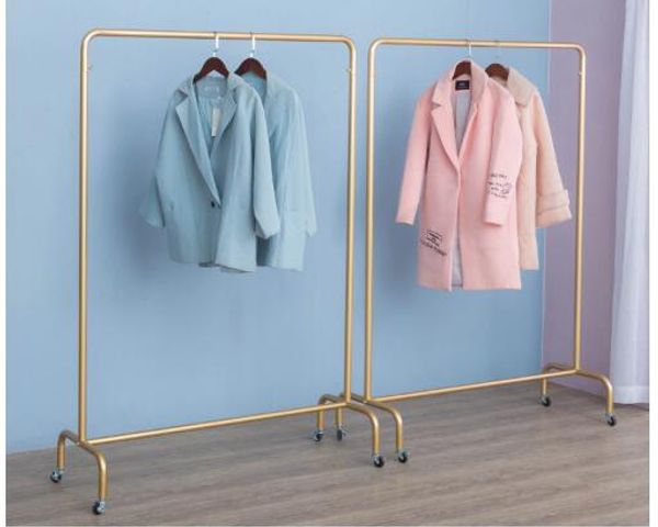 Clothing store featuring pulley racks, bedroom furniture, women's apparel display, nano-gold shelves, and movable hanging racks