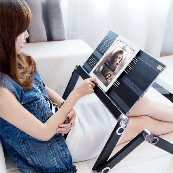 Compact folding laptop stand for beds with aluminum alloy construction and built-in cooling fan