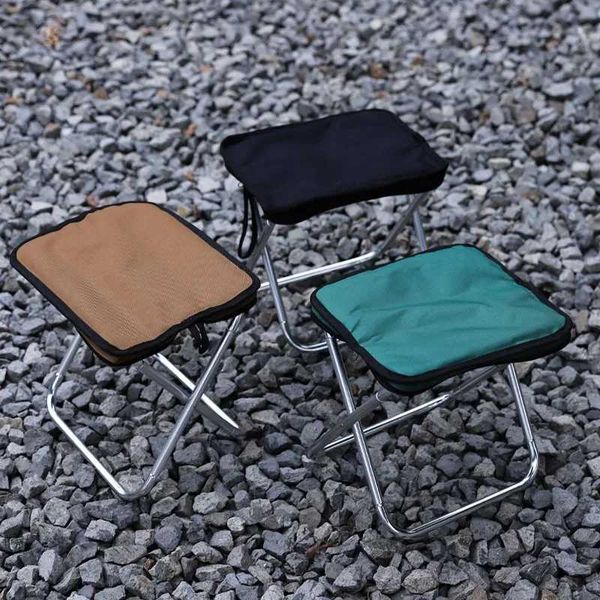 Compact outdoor folding stool, lightweight aluminum alloy seat for camping, fishing, picnics, and beach use with carry bag