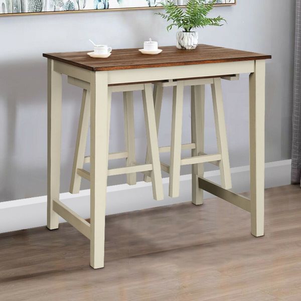 Counter-height pub table featuring two saddle-style bar stools