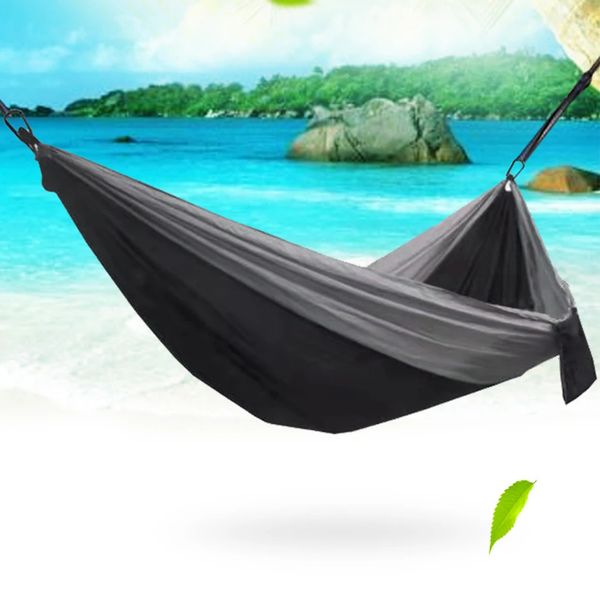 Durable, lightweight red parachute hammock for comfortable camping and hiking outdoors