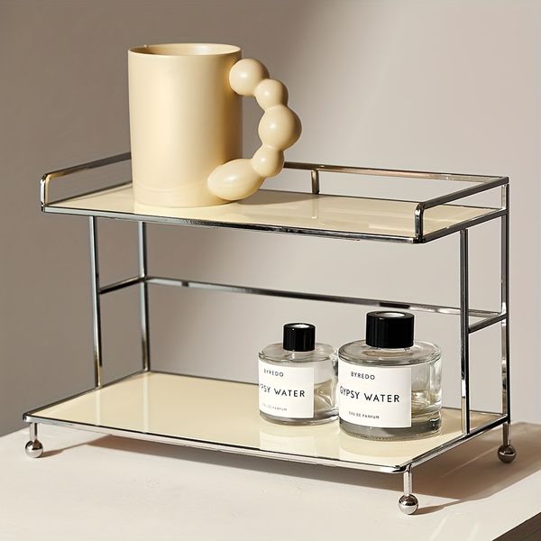Elegant black acrylic vanity organizer with Nordic style for displaying cosmetics, perfumes, and bathroom essentials on countertop