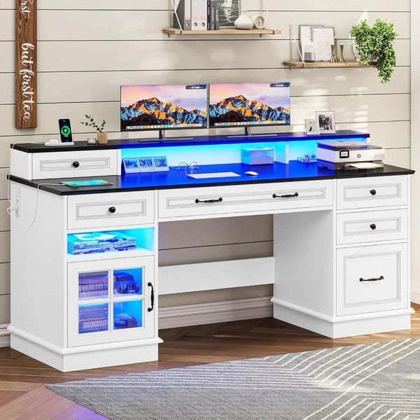 Executive Desk: Office workstation for executives  
Computer Drawers Storage Cabinet: Storage unit with drawers for computer accessories  
Home Office Desk with File Drawer & Monitor Stand: Workspace featuring file storage and monitor platform