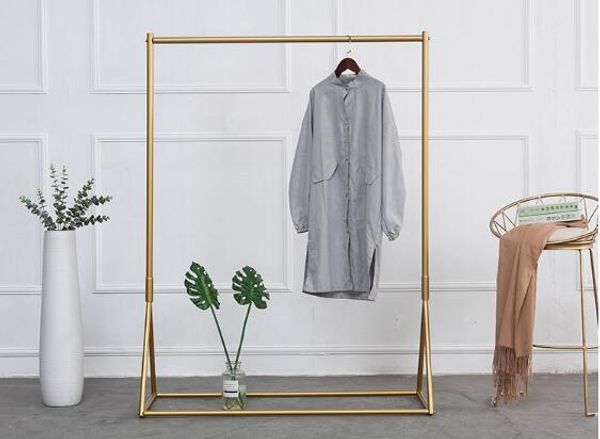 Golden clothing rack with iron floor stand for bedroom furniture, kids' shop display and women's bag showcase