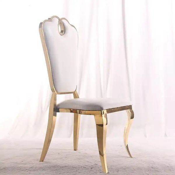 Golden wedding chairs and tables with elegant gold decor for seating