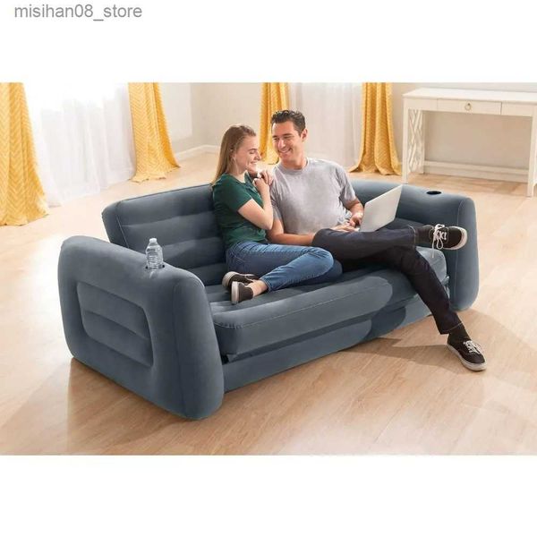 Inflatable sofa with built-in cup holders and a soft velvety surface, featuring a 2-in-1 valve design