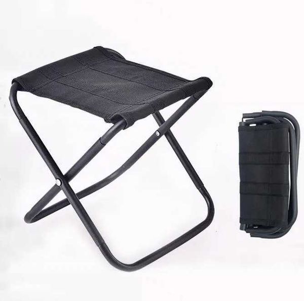 Lightweight, sturdy outdoor folding chair featuring pockets and an aluminum footstool for camping and fishing