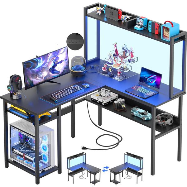 L-shaped gaming desk with LED lighting, power outlets, and hutch for two in black oak finish