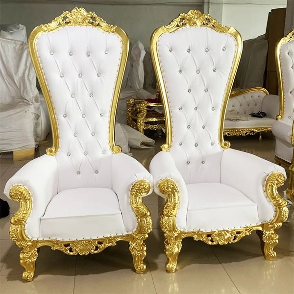 Luxurious white and gold royal throne chair for elegant wedding decorations