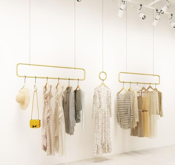 Luxury nano gold clothing racks for women's fashion displays in shopping malls