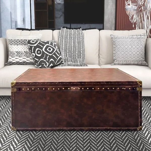 Modern retractable brown trunk with studs for travel accessories storage