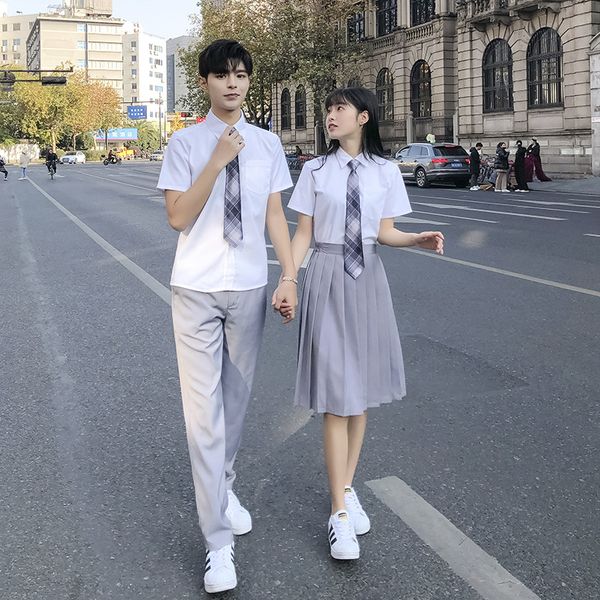 New Korean-style school uniforms for female students, featuring white shirts and pants suits in college-inspired designs