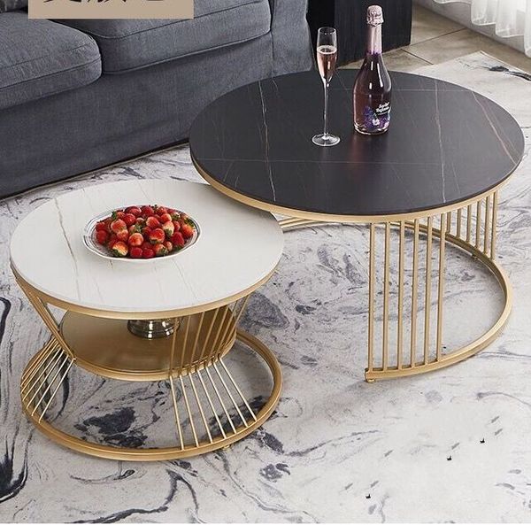 Nordic luxury marble coffee table with stainless steel base, crafted for modern living rooms