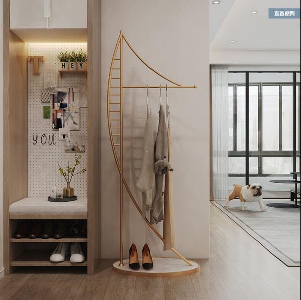 Nordic-inspired bedroom clothing rack with marble base for stylish home organization
