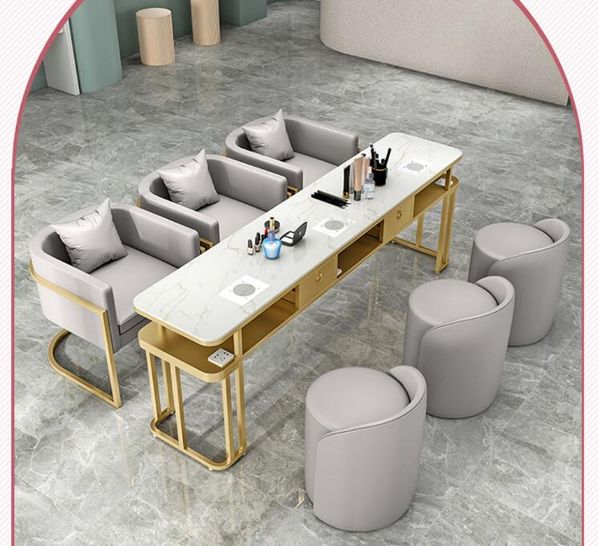 Nordic-inspired marble nail table with matching chairs, featuring built-in vacuum and power outlets for single, double or triple workstations