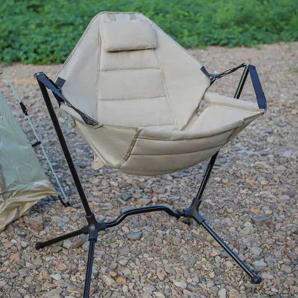 Outdoor adjustable folding hammock chair for wheelchair users, ideal for picnics, camping, and garden relaxation with a handy pocket