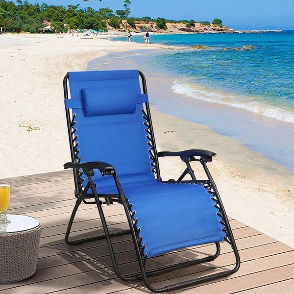 Oversized zero-gravity folding chair for outdoor relaxation, featuring an adjustable headrest, ideal for beach or garden use