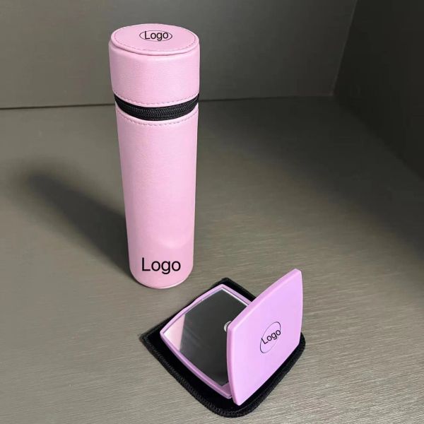 Pink and purple designer makeup brush holder with classic logo, also functions as a pen, chopstick, spoon, and mirror storage cylinder set