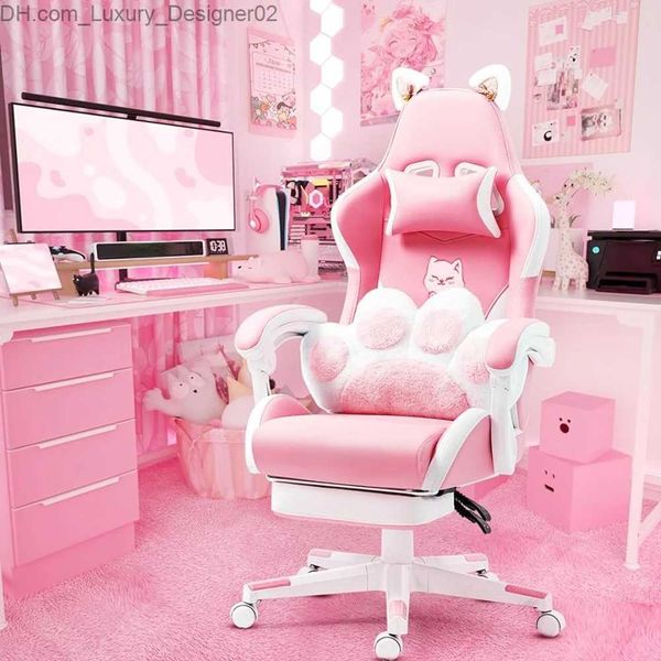 Pink gaming claw lumbar cushion with cat ears and ergonomic computer chair featuring a footrest, ideal for girls and teens