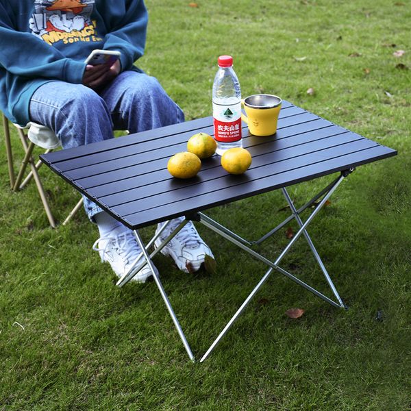 Portable folding picnic table made of lightweight aluminum alloy for outdoor use