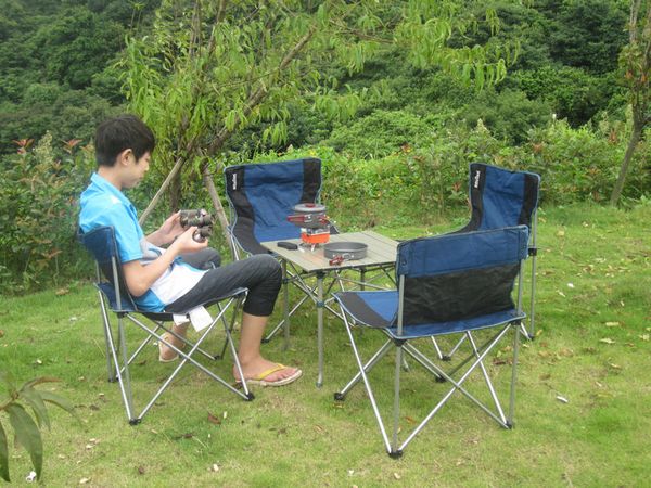 Portable folding table and chair set for outdoor camping, picnics, and fishing in camouflage design
