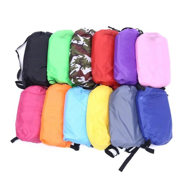 Portable inflatable lounger for outdoor relaxation, beach trips, camping, and picnics