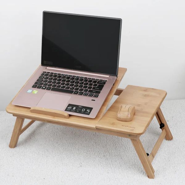 Portable laptop desk for comfortable use on bed or sofa, ideal for studying and reading