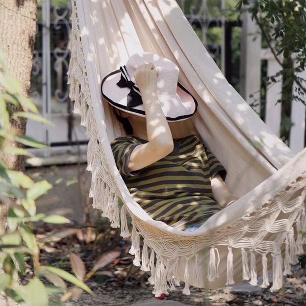Portable outdoor hammock chair with tassels, foldable for camping and hiking
