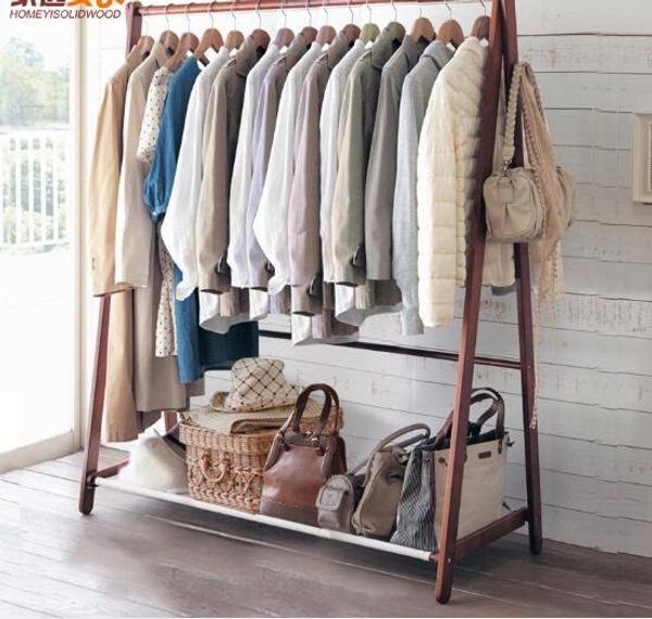 Solid wood floor-standing bedroom furniture with 16 design options, featuring simple cloth hat hangers on a wooden rack