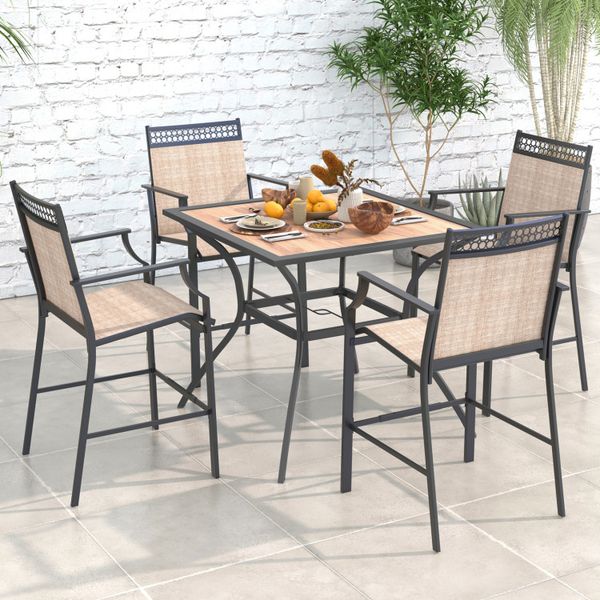 Square bistro table for four with umbrella holes, ideal for patio dining