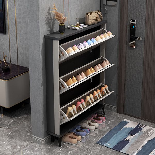 The entrance features a stylish, narrow shoe cabinet in light luxury design, perfect for small doorways