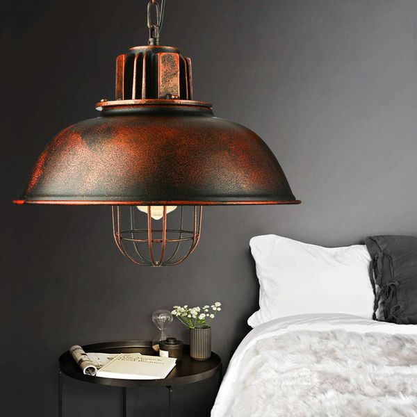 Vintage iron lantern-style pendant light with a rustic farmhouse charm for ceiling hanging