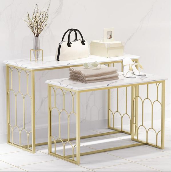 Window display table for commercial furniture featuring women's clothing racks in nano gold and solid wood water designs