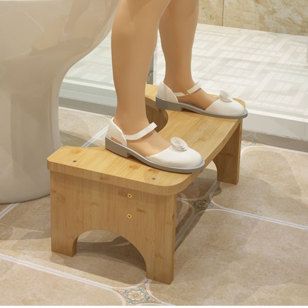Wooden step stool for bathroom use by children, adults, and elderly to assist with toilet access